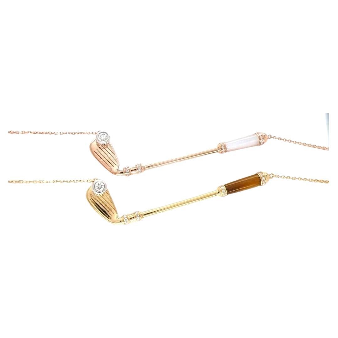 18K Yellow Gold
Golden Brown Tiger's Eye Gemstone Handle
White Diamond Golf Ball Gemstone
0.25 cts Diamonds
16-18 inches Diamond-Cut Link Cable chain length
In-Stock
This is part of Galt & Bro. Jewelry's exclusive, custom made-to-order Golf Club