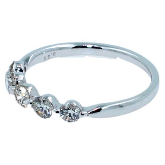 0.50 Carat Diamond Thin Small Stackable Dainty Line Half Band White Gold Ring
0.50 cts Diamonds GI Color, VS Clarity 
Very Brilliant & Sparkly Diamonds
18K White Gold 
Size 6.25 - Resizable Upon Request