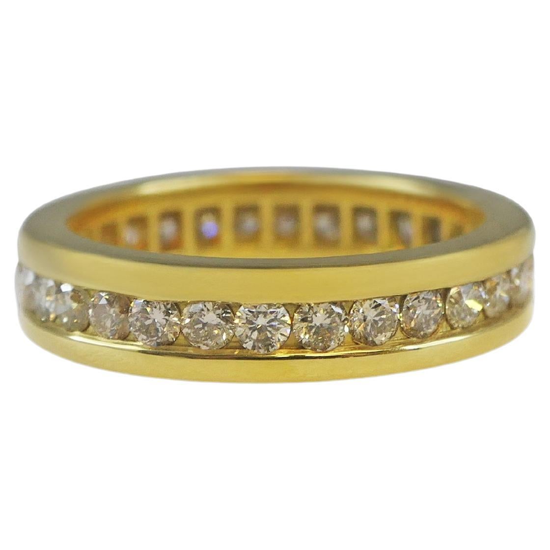Diamond Channel Set Eternity Band Classic Stackable 18 Karat Yellow Gold Ring For Sale
