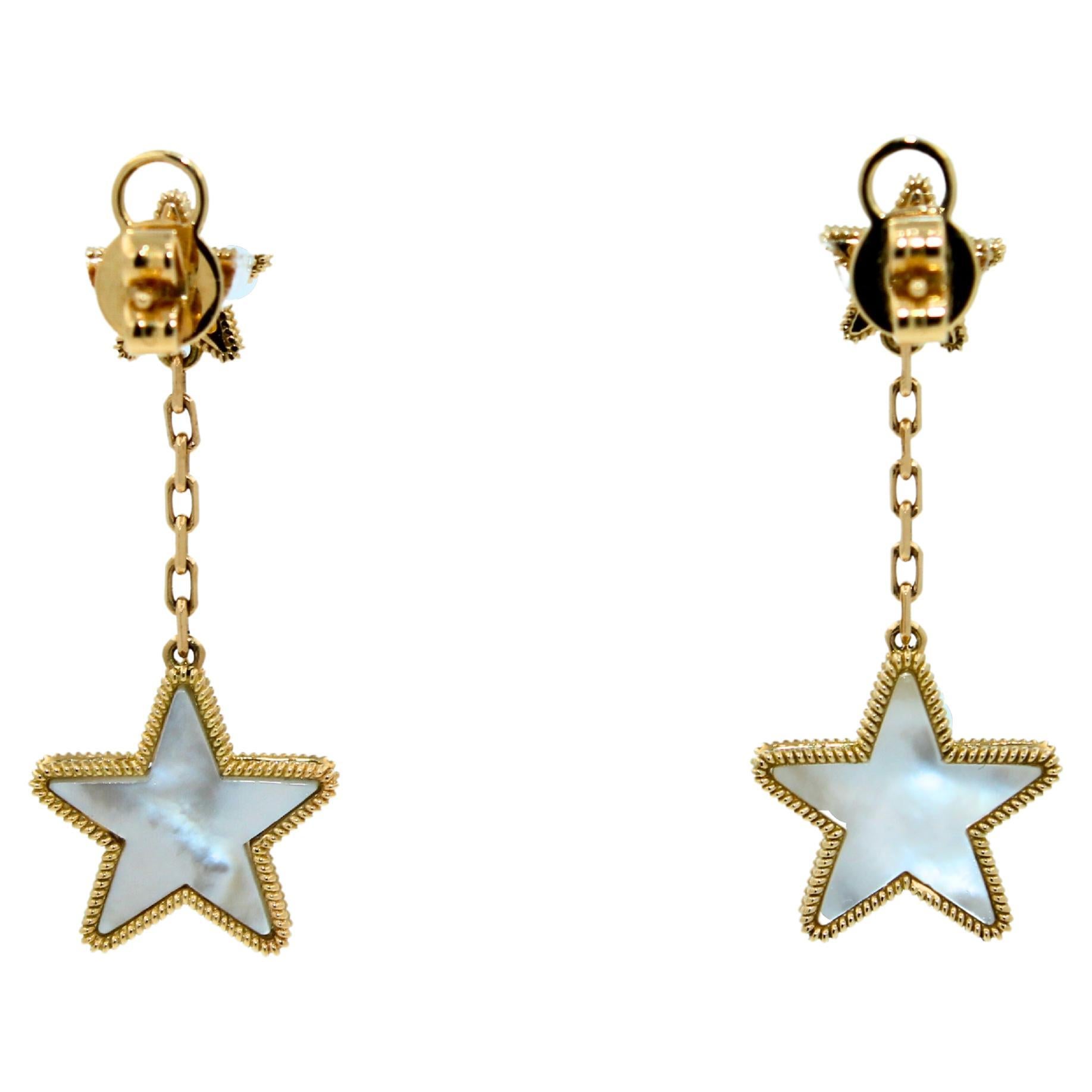 Silvery White Pearl Star Galaxy Celestial Constellation Zodiac 18K Gold Earrings
18K Yellow Gold
Silvery White Mother of Pearl Cabochon Gemstones in a handcut, unique Star Shapes