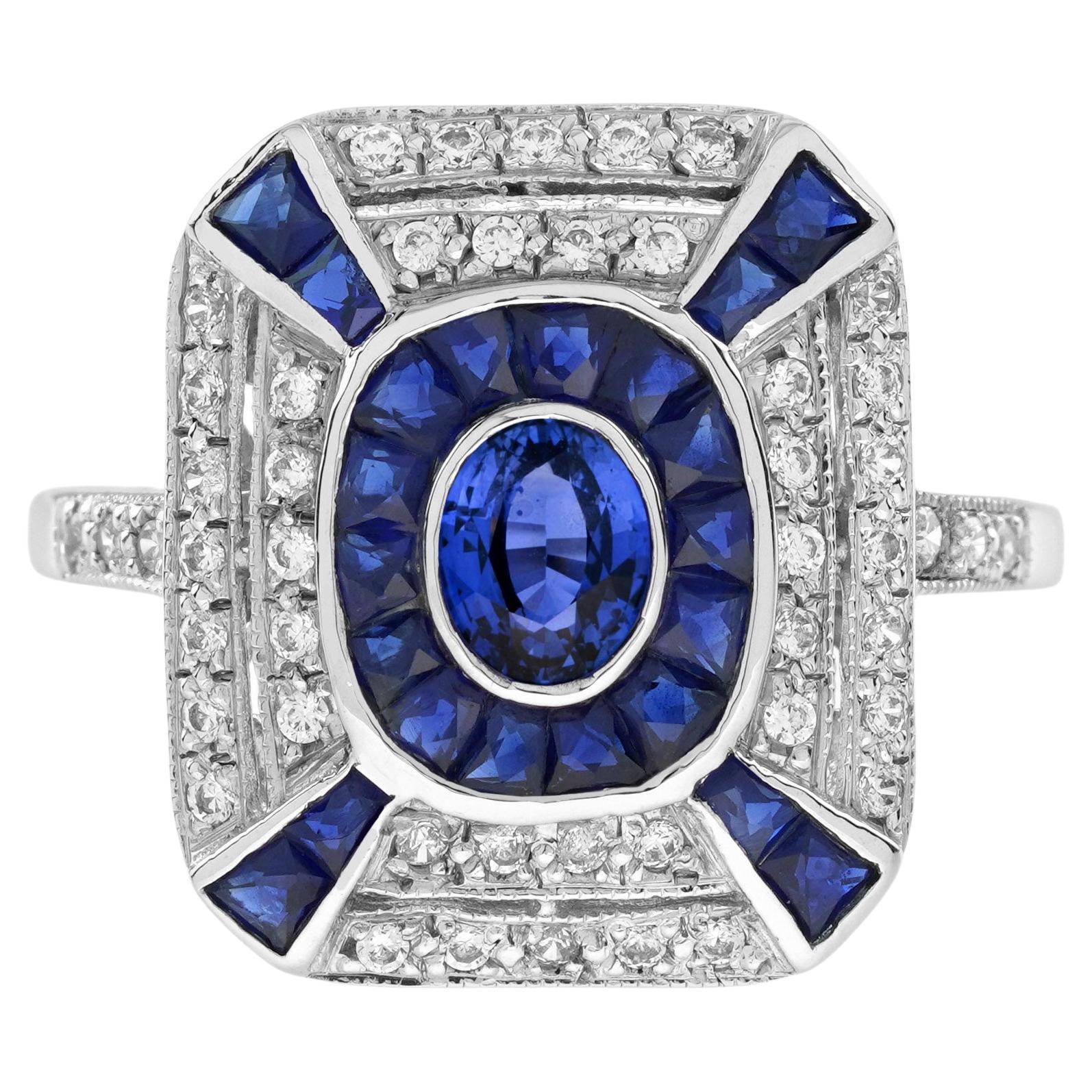 Anello con zaffiro blu di forma ovale e diamante in stile Art Deco con alone in oro bianco 14 carati in vendita