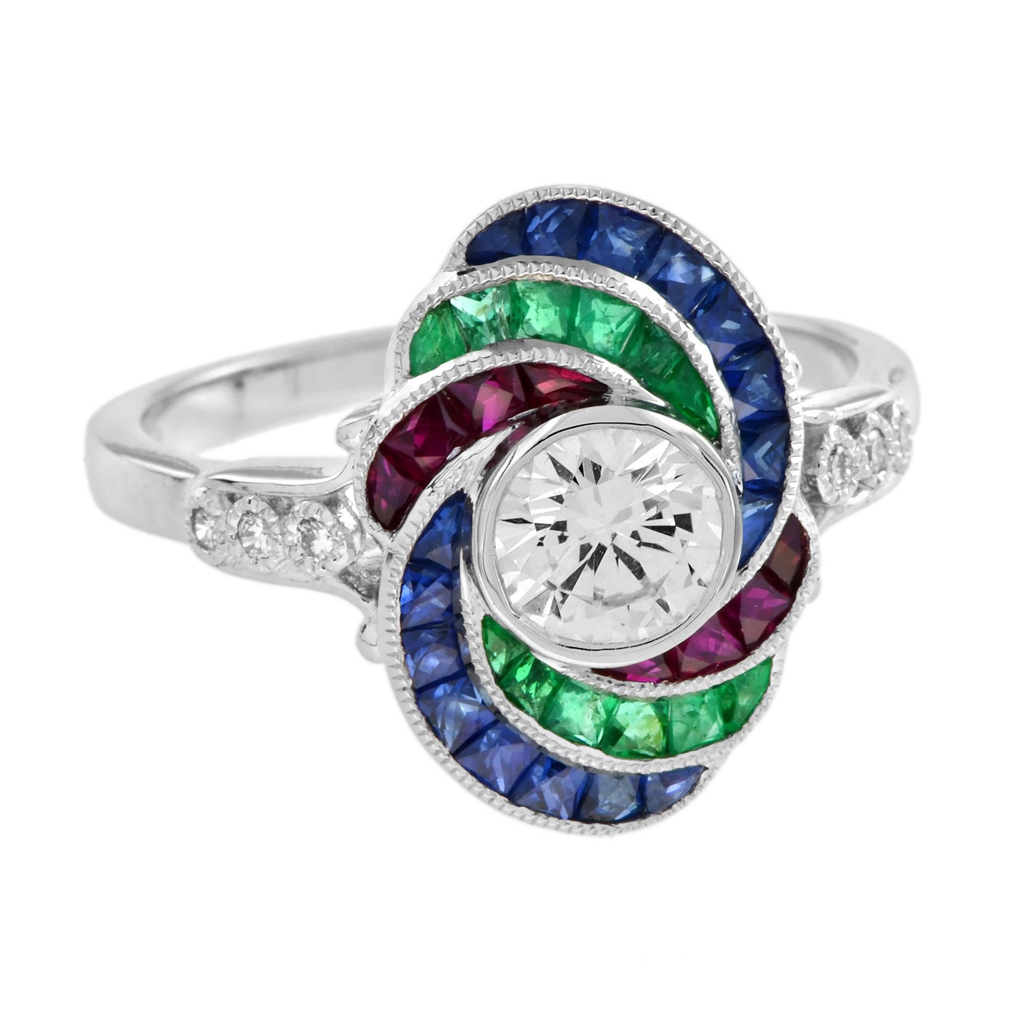 Tauchen Sie ein in den Glamour dieses vom Art Deco inspirierten Diamant- und Multistein-Dinnerrings. Ein schillerndes Echo einer Ära, die von Eleganz und Überschwang geprägt war. In der Mitte befindet sich ein runder Brillantschliff in