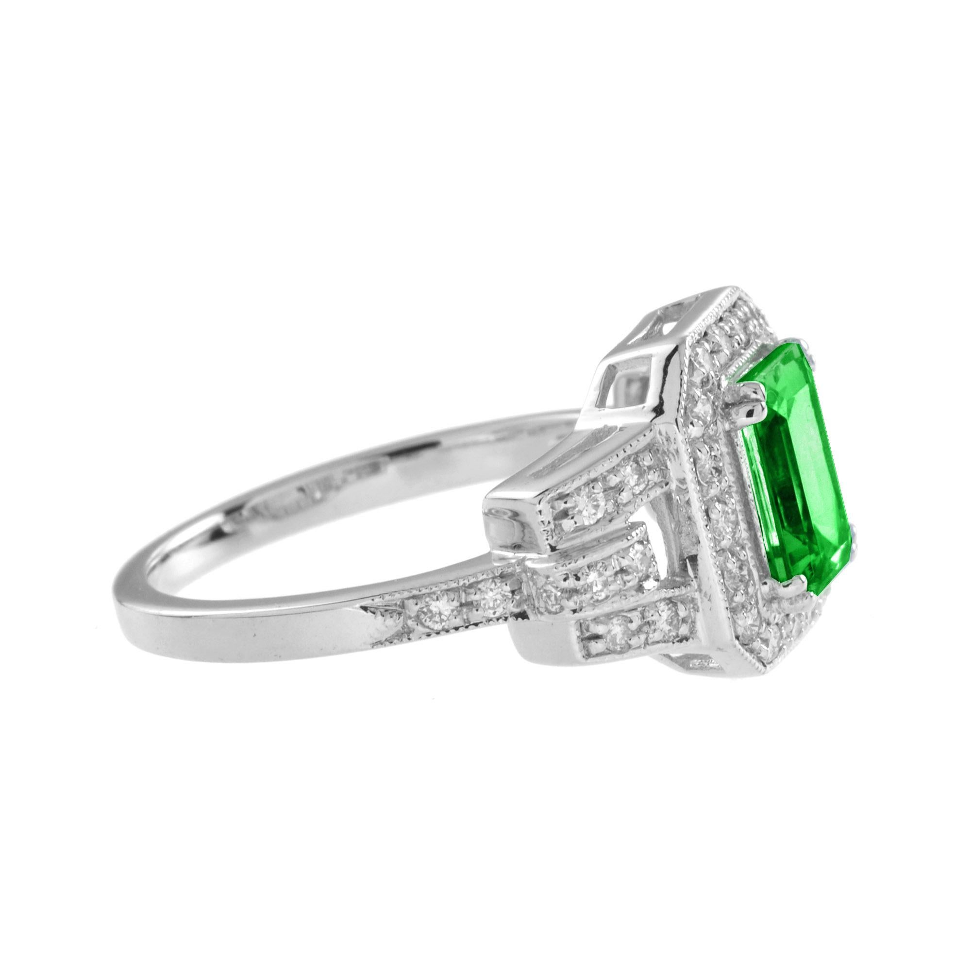 L'affascinante anello di fidanzamento con tsavorite. Questo anello ispirato all'Art Déco è un anello da cocktail dinamico o un pezzo forte. Al centro un taglio a smeraldo di 3 carati di una tsavorite verde brillante. Accenti e spalle elegantemente
