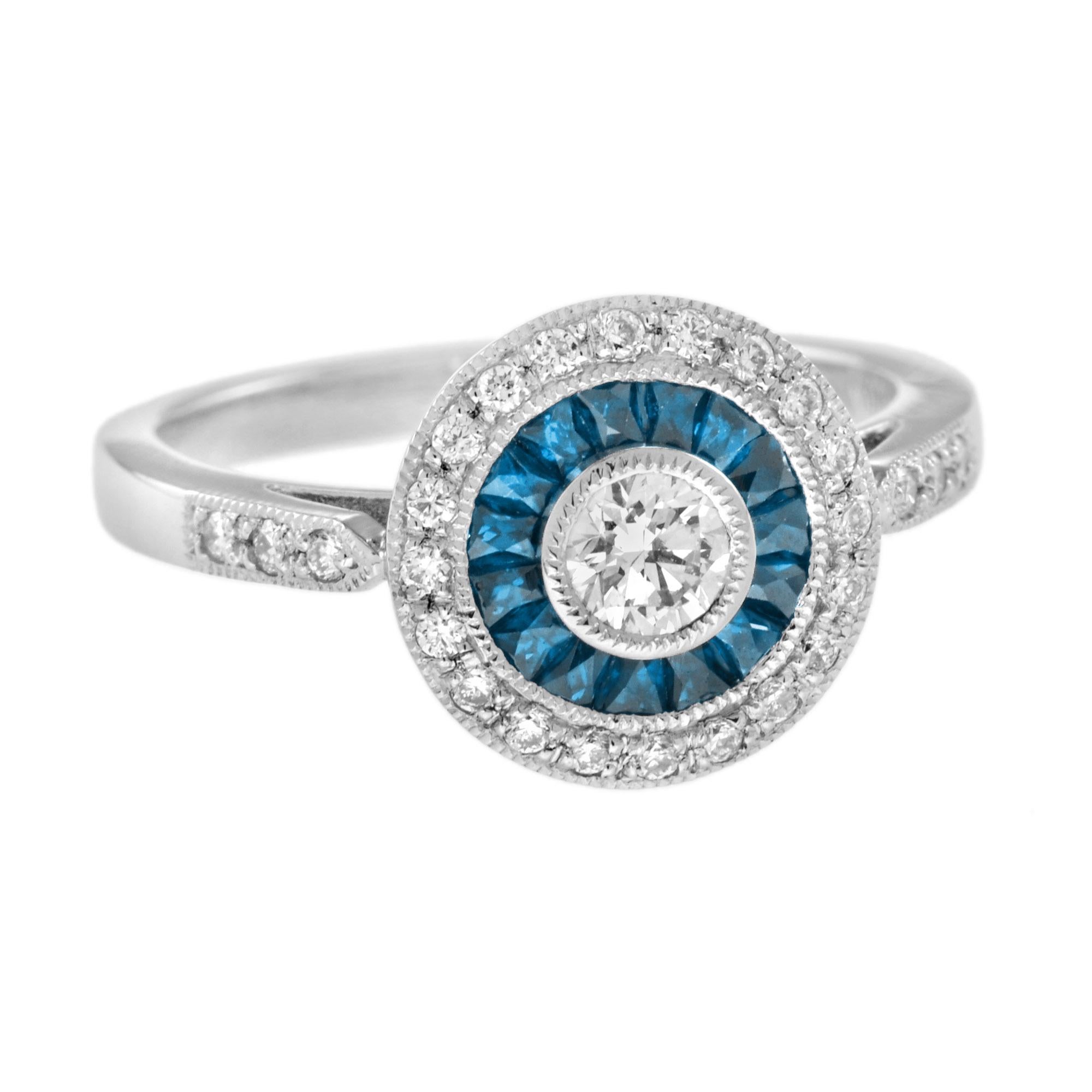 Questo anello di fidanzamento Art-Deco è assolutamente spettacolare! Le pietre di colore vibrante del topazio blu di Londra sono tagliate in modo speciale per circondare l'eccellente diamante centrale rotondo a taglio brillante, che si trova in un