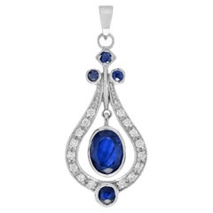 Pendentif en or blanc 14K saphir bleu et diamant blanc de forme ovale de style Art Déco