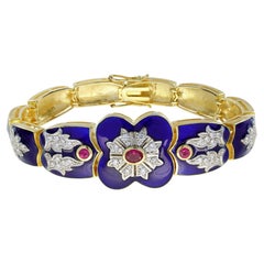 Bracciale in oro giallo 14K con diamante e rubino e smalto blu di ispirazione antica