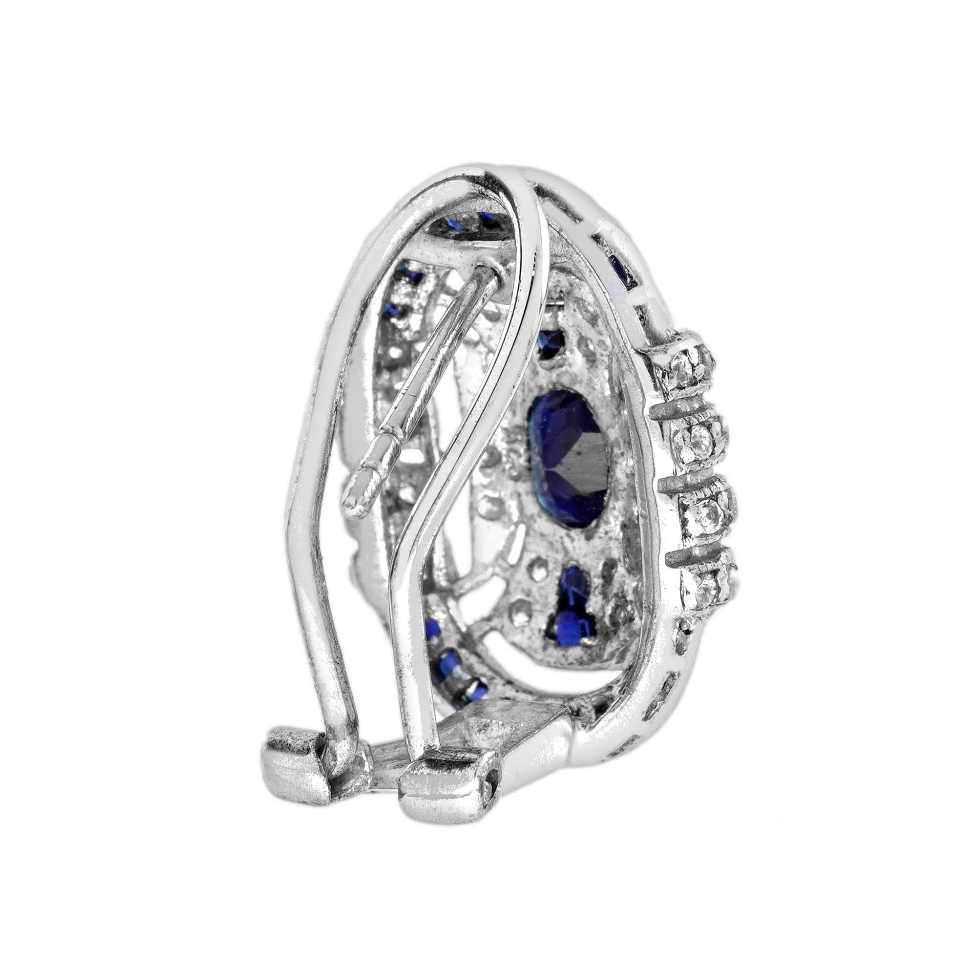 Art déco Boucles d'oreilles saphir bleu et diamant style Art Déco Omega en or blanc 14K en vente