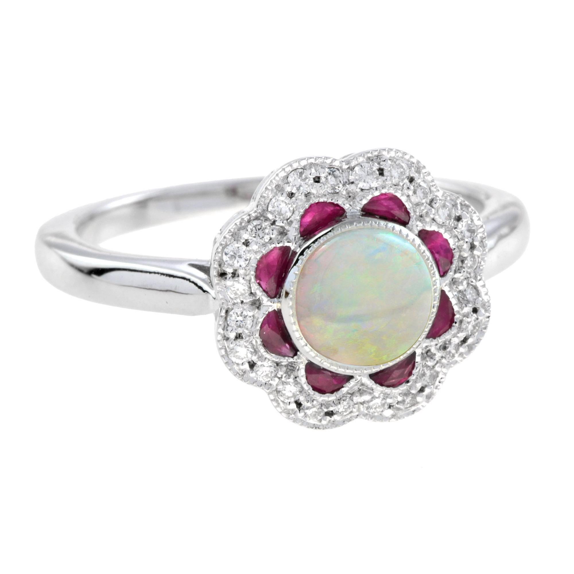Questo squisito anello presenta un'opale centrale iridescente impreziosita da un bel rubino e da scintillanti diamanti. Come a formare un bellissimo fiore. Un regalo di gioielli da custodire per sempre, adatto agli amanti dei gioielli di ispirazione