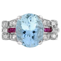 Topacio Azul Ovalado y Anillo de Oro Blanco de 14 K Estilo Art Decó con Diamantes y Rubíes