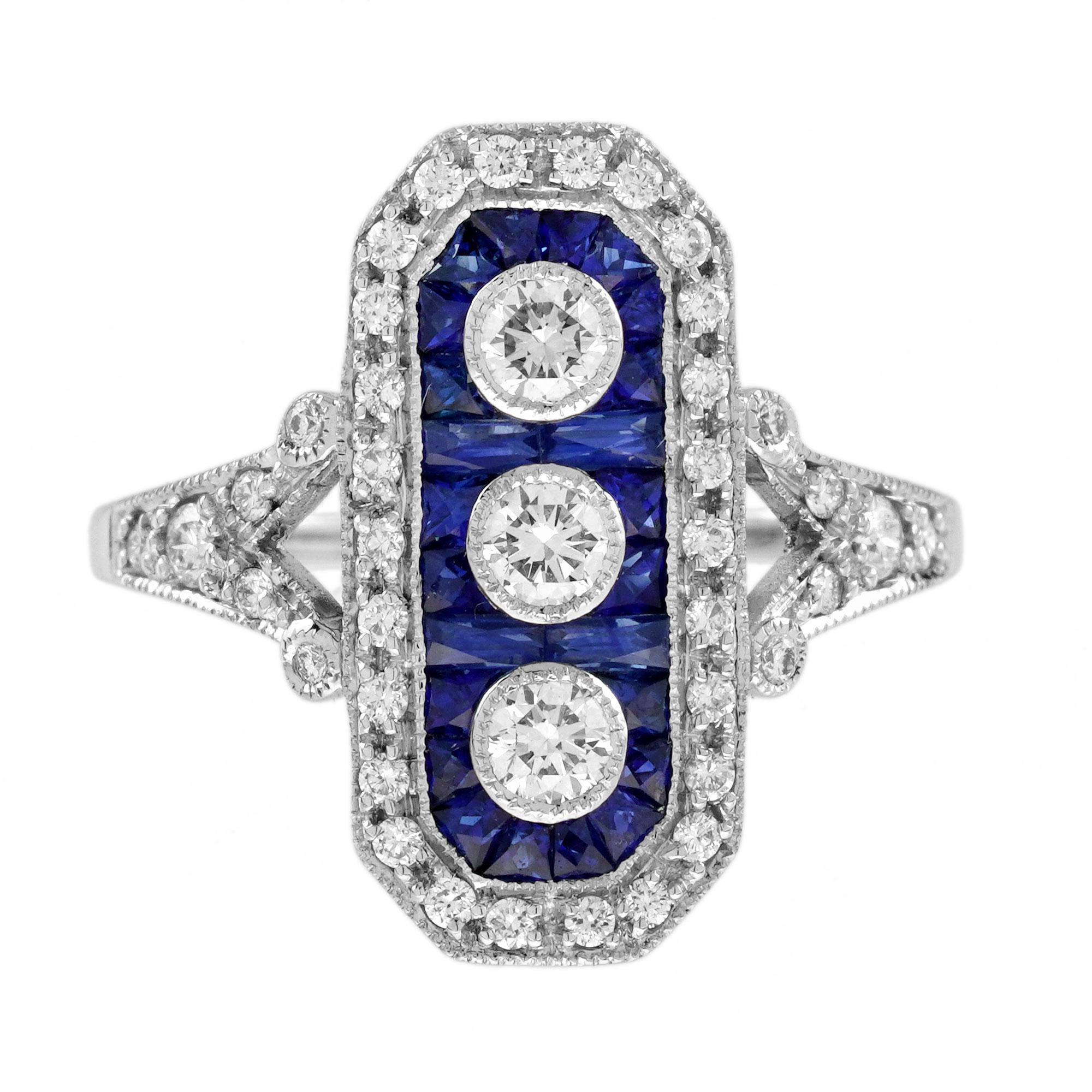 Un lampo verticale di scintille senza soluzione di continuità è creato da tre diamanti centrali a taglio rotondo in questo superlativo e assolutamente impressionante anello da cena in stile Art Deco. Lo scintillante Trio è delineato da una cornice