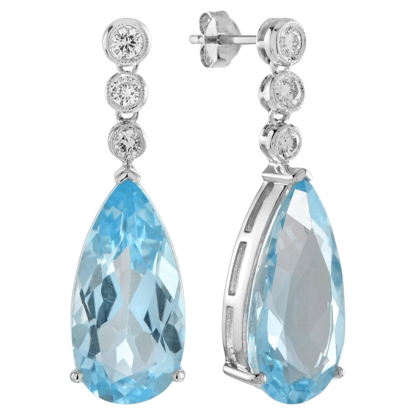 Orecchini a goccia in oro bianco 14K con topazio blu e diamanti a forma di pera