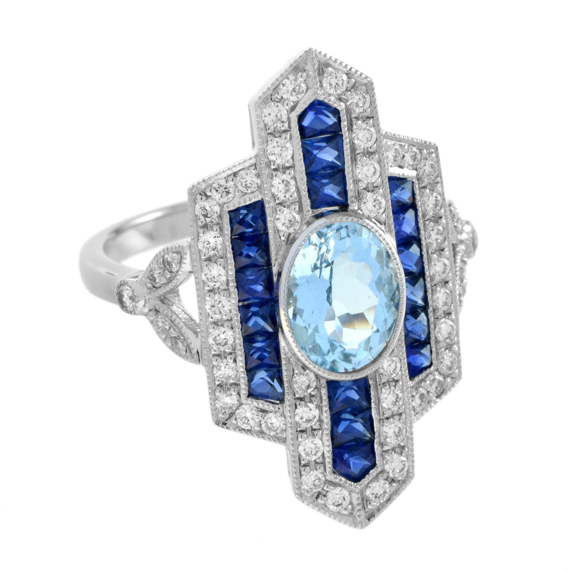 Bellissimo anello da cena dal design antico, creato con una forma geometrica. Al centro è montata una castone con un'acquamarina di forma ovale di circa 1,20 carati, circondata da zaffiri blu taglio francese e diamanti. Accattivante e classicamente