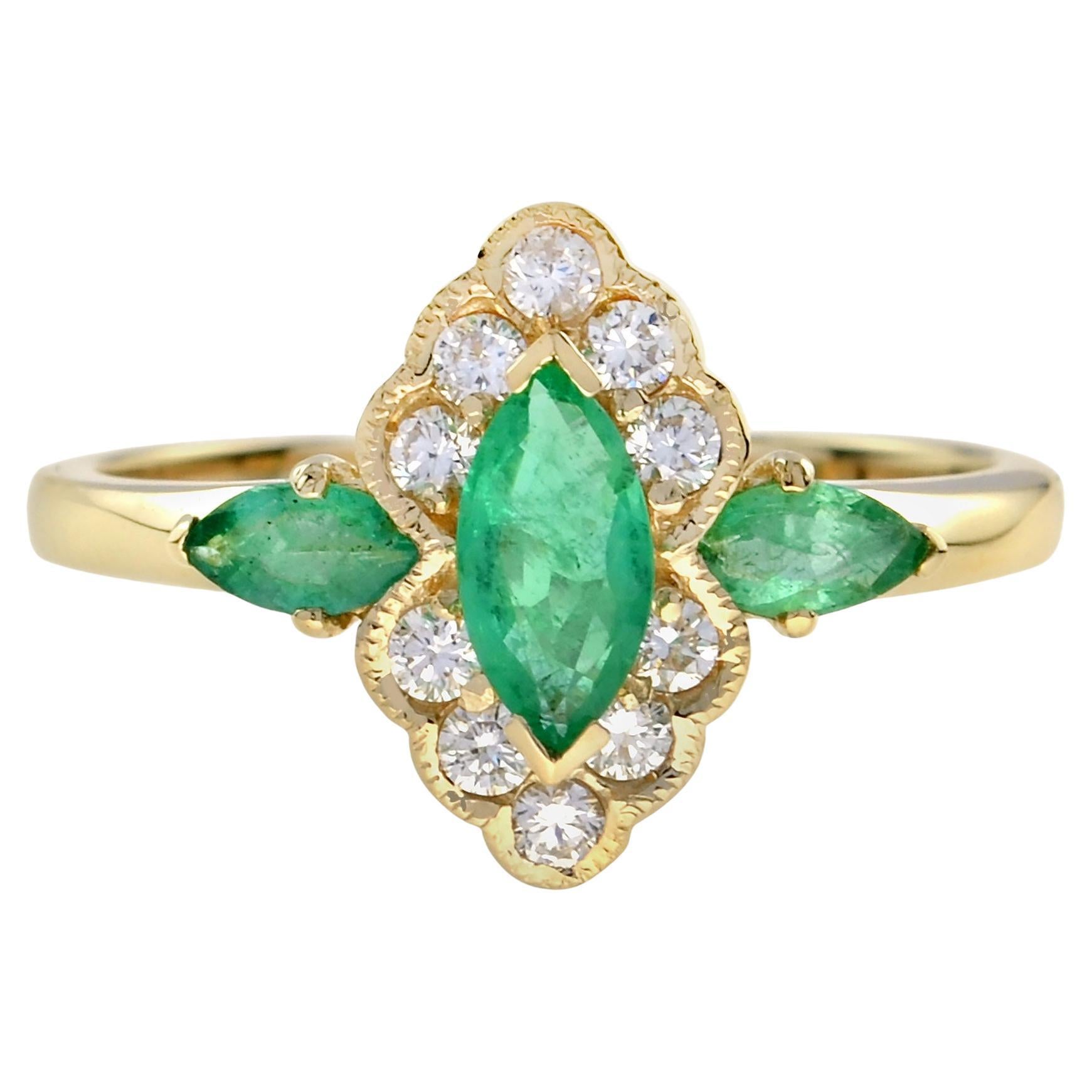 Anello in oro con smeraldo verde e diamanti a raggiera in stile Art Deco a forma di marquise in vendita