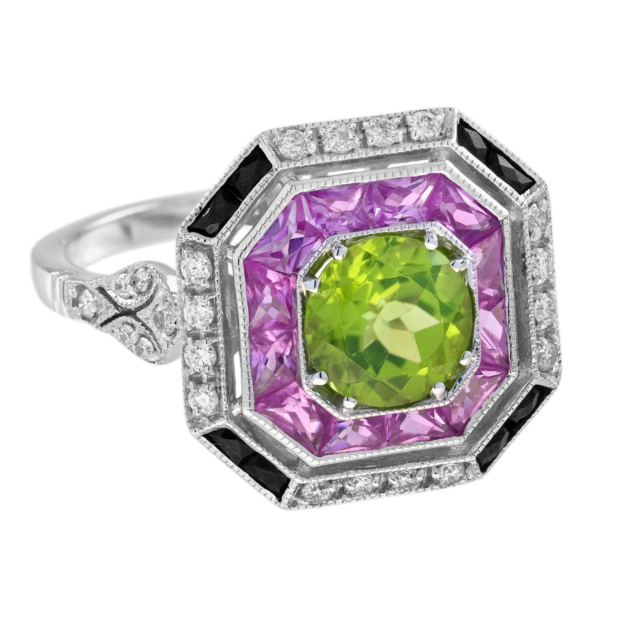 Questo anello da abito è sapientemente realizzato in oro bianco Eleg. Presenta un peridoto rotondo incastonato al centro del disegno. La pietra centrale è immersa in un letto di incantevoli zaffiri rosa taglio francese e di scintillanti diamanti