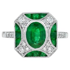 Esmeralda verde ovalada y diamante Anillo vintage de oro blanco estilo Art Déco