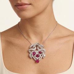 Art Deco Carved Burmese Ruby and Diamond Platinum Convertible Pendant, Circa 192