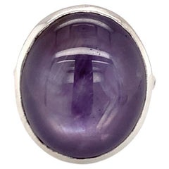 Mid-Century Oversized Purple Star Sapphire Ring, 18K White Gold, circa 1950s."