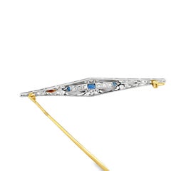 Art Deco Platinum 0.3ct Sapphire, Onyx and 1.5ct Diamond Bar Pin, Circa 1920s