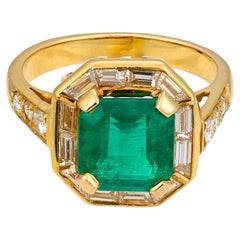 2.15ct Emerald and 0.85ct Diamond Ring in 18K Yellow Gold, Circa 1970s