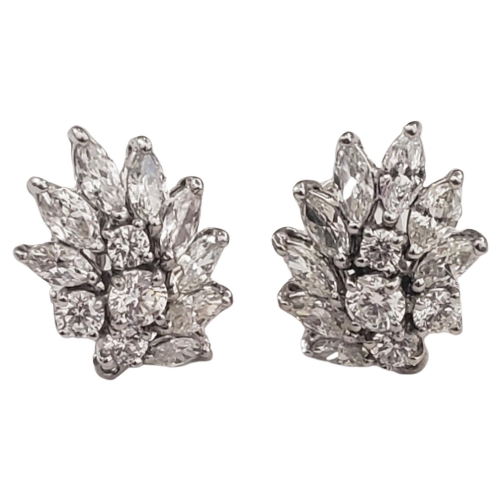 For those who appreciate the finer things in life, these exquisite diamond earrings in platinum from LaFrancee are the perfect addition to any jewelry collection. Crafted from platinum, these omega clip-style earrings feature dazzling diamonds that