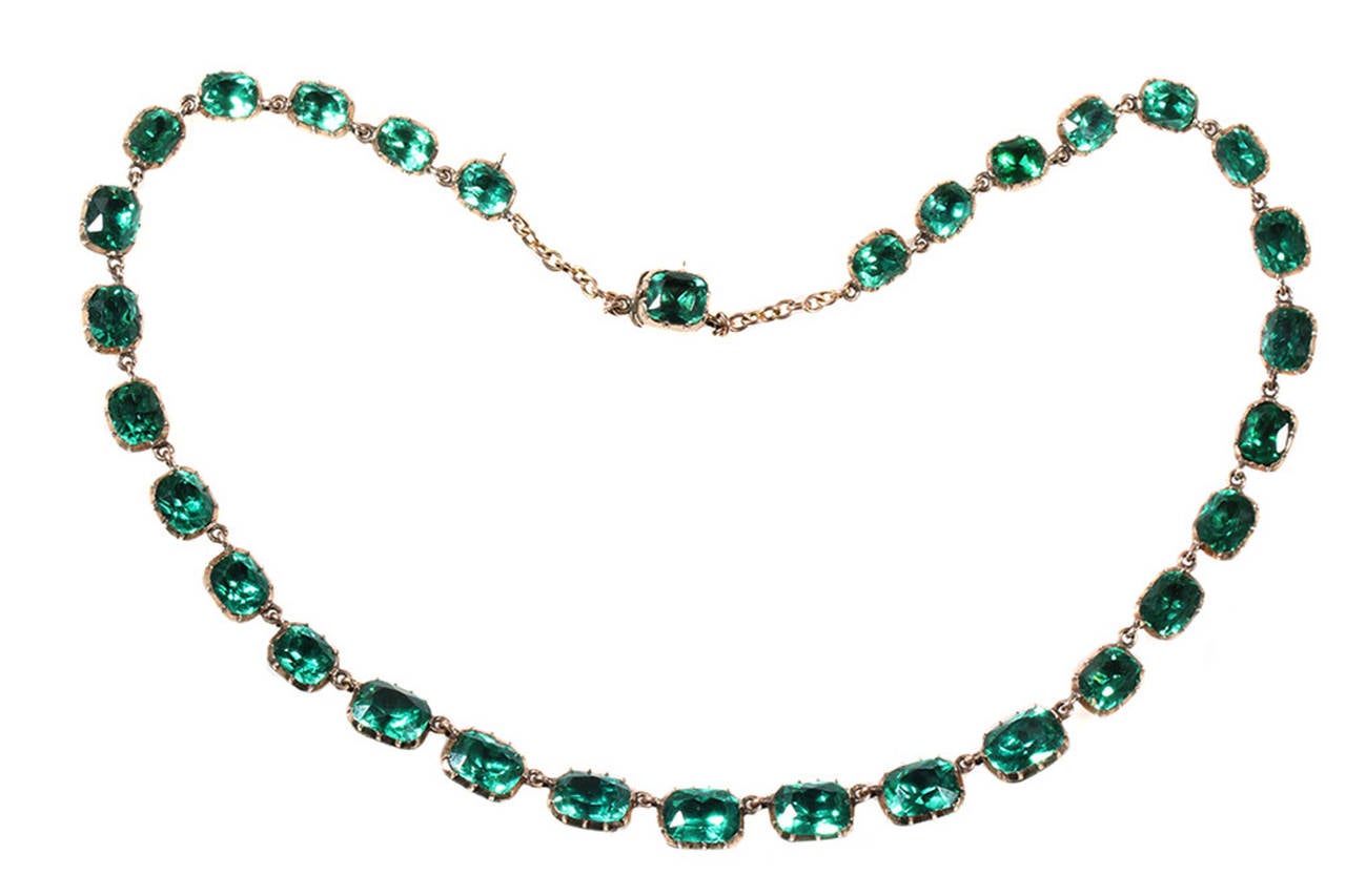 Georgian era Emerald paste necklace in 15k gold. English in origin. Circa 1820. Very wearable length of 17