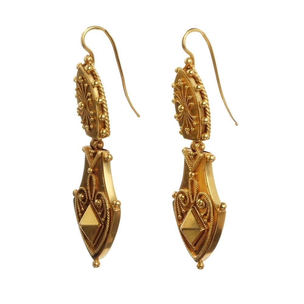 Victorian era 15k gold earrings with hobnail and granulation details. Beautiful etruscan revival design and light weight. Perfect for everyday wear. English in origin, circa 1860. English in Origin.

2