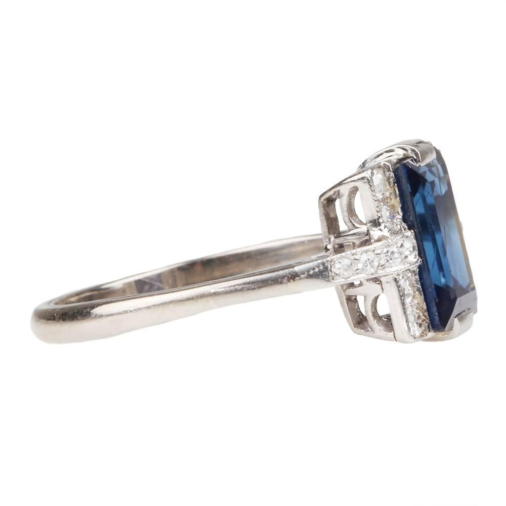 Art Deco sapphire and diamond ring. Circa 1920's. Rectangle cut sapphire approx. 2.4 carats surrounded by pave set diamonds mounted in platinum. The sapphire is non-heat treated, Australian in origin, AGL certification #CS71417. 

Size 6.25, can