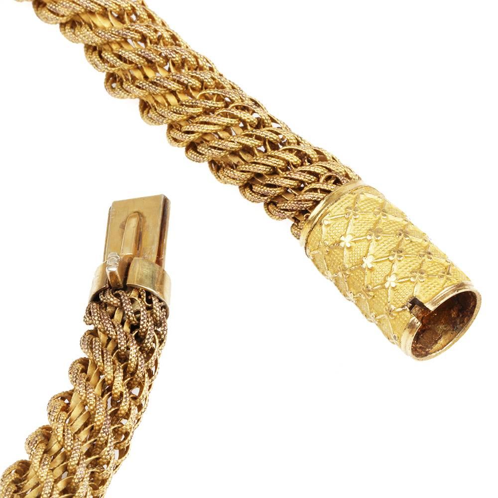 Georgian era pinchbeck spiral woven Necklace. Pinchbeck is a gold metal alloy used in the 18th and 19th centuries. Circa 1830, English in Origin.

Push clasp. 19.5