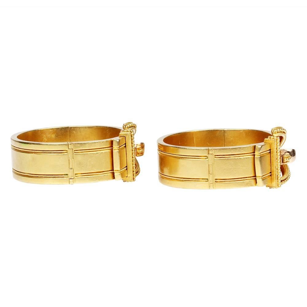 Victorian era matched set gold buckle bangles, 14k gold. The matched set together is a rare find. The buckle is a Victorian age symbol of strength and loyalty. English in origin. Circa 1860-80.

Small in size, measuring 6" in inner