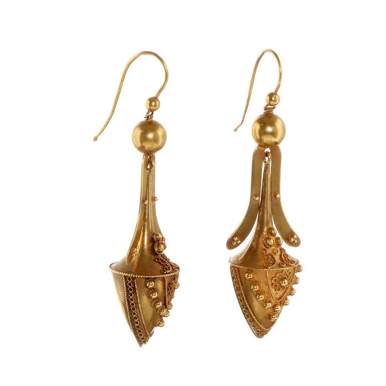 Victorian 18k gold earrings in a classical urn form with great Etruscan granulation details.  The earrings are in their original form with a beautiful original bloomed patina.  Circa 1870. English in Origin.