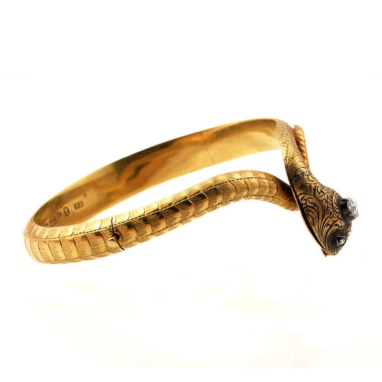 Victorian Era 18k Gold Snake Bangle with Two Hidden Locket Compartments, Diamond Head & Eyes. Swedish in Origin, in Original Box.  Hallmarks indicate a manufacture date of 1864.