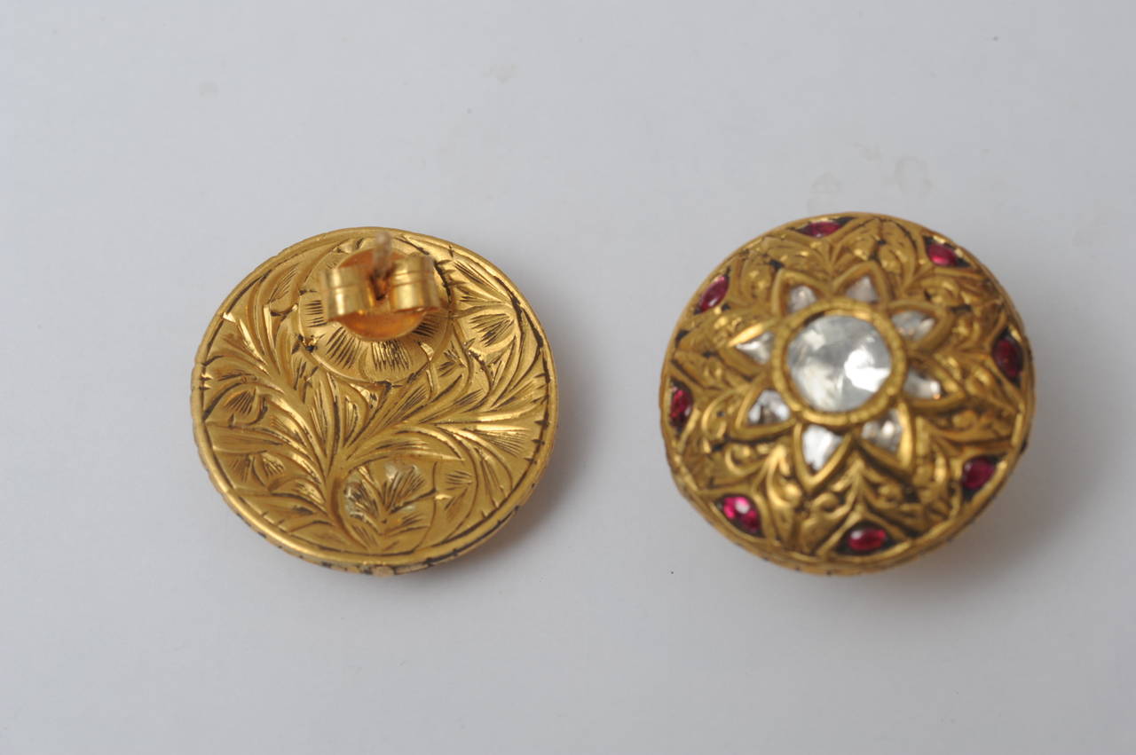Beautiful button earrings with Kundan set rosecut diamonds and cabochon rubies in 22K gold with hand-tooling on the reverse side.  Indian, 1960's.

Fine Jewelry located on Nantucket Island