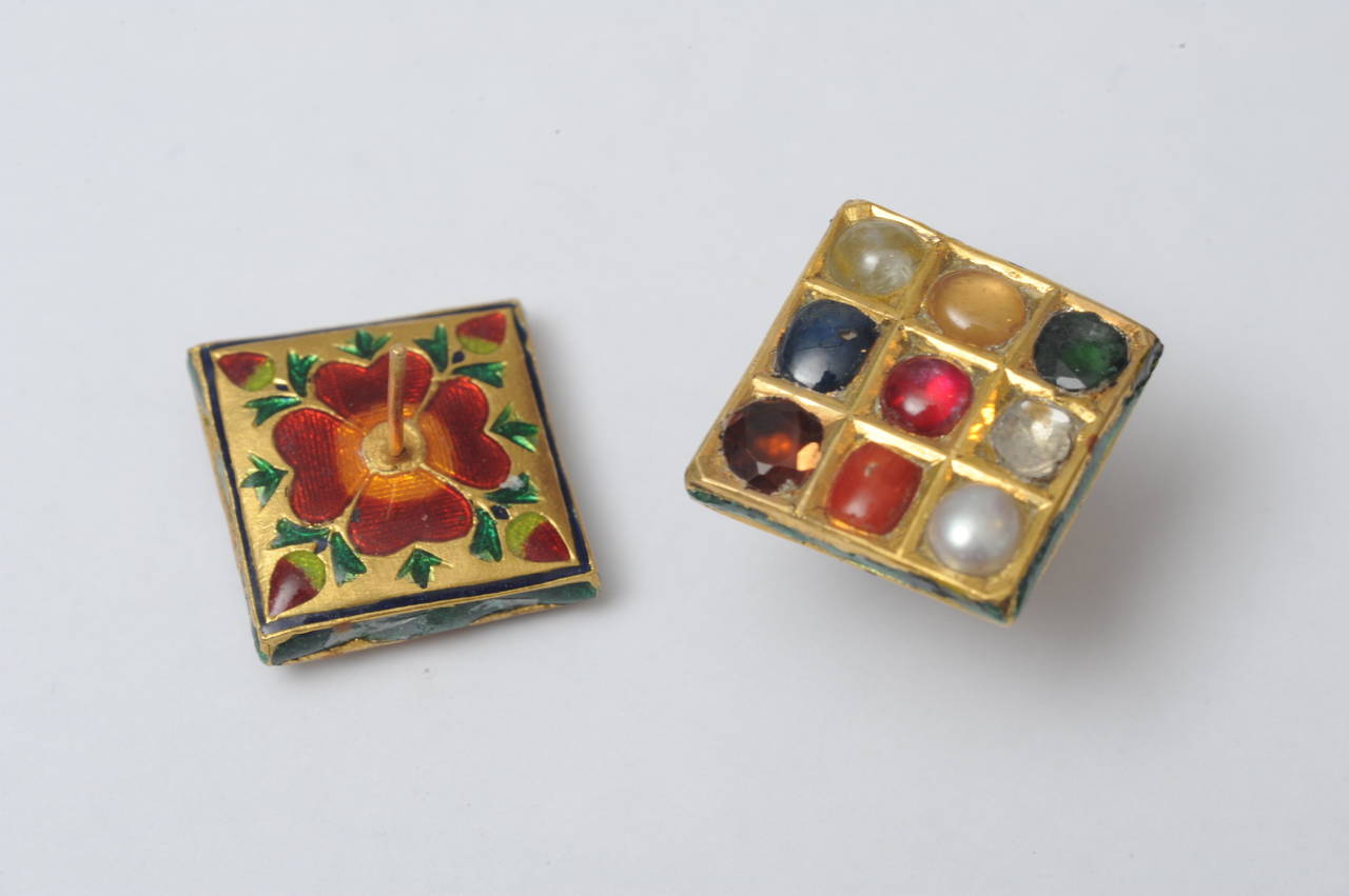Stunning pair of gemstone and 22 K gold earrings symbolizing the Nava Ratna Hindu mythology which correlates to the planetary system and brings the wearer good fortune.  Beautiful enamel work on the reverse side--what's touching your skin should be