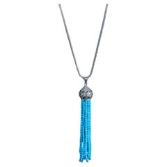 Collar largo de diamantes y borlas de turquesa con cadena de plata de ley
