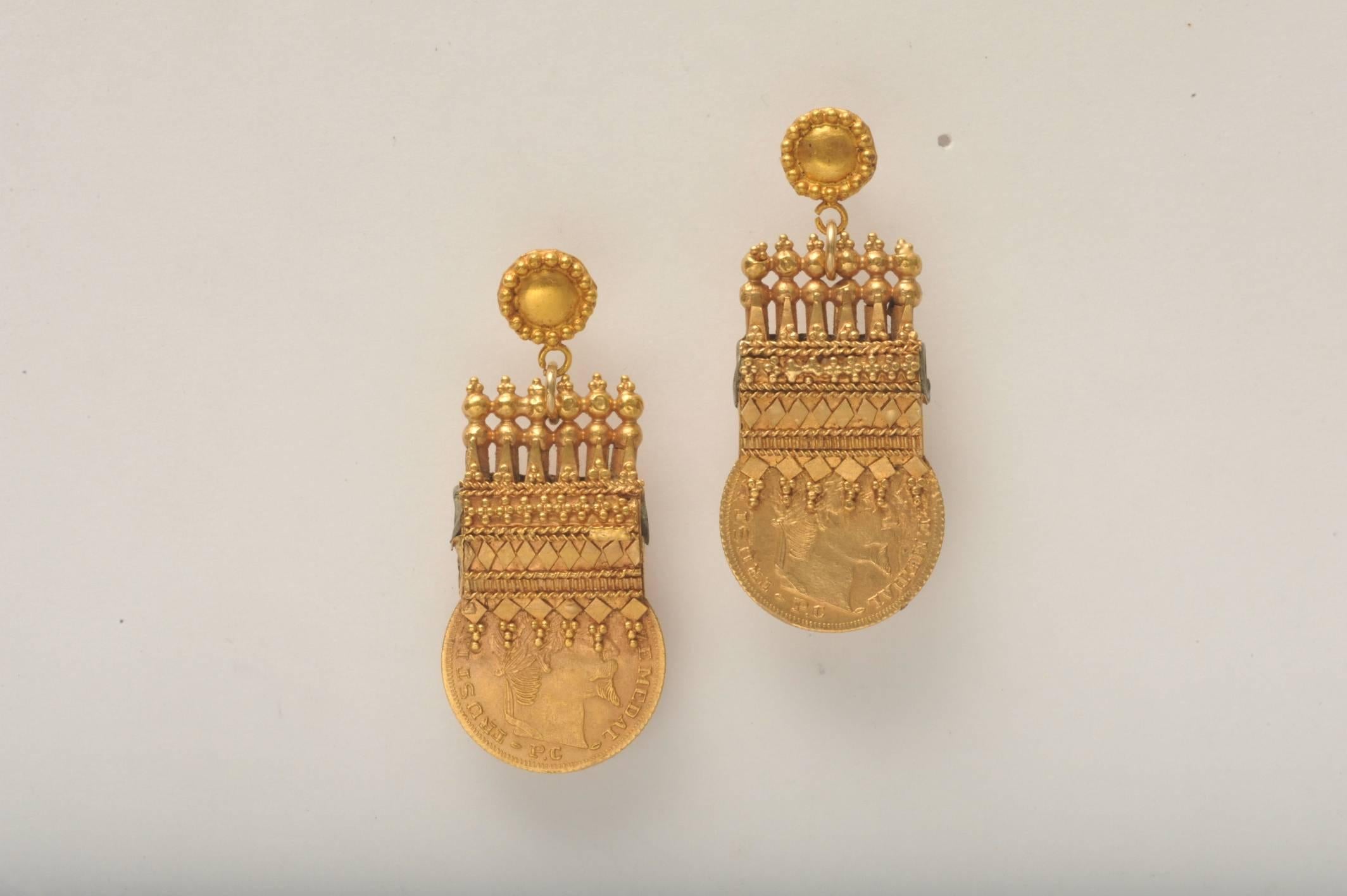 The fine granulation and Etruscan design detail work on these earrings is truly remarkable.  22K gold and old 22K gold English coins--these were made originally to be pendants, the 22K gold post has been added.  Unusual and fabulous.  Coins are