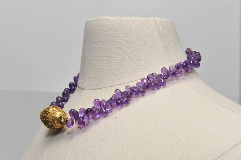 Faceted Amethyst Briolettes with 22 Karat Gold Centerpiece Bead at 1stDibs