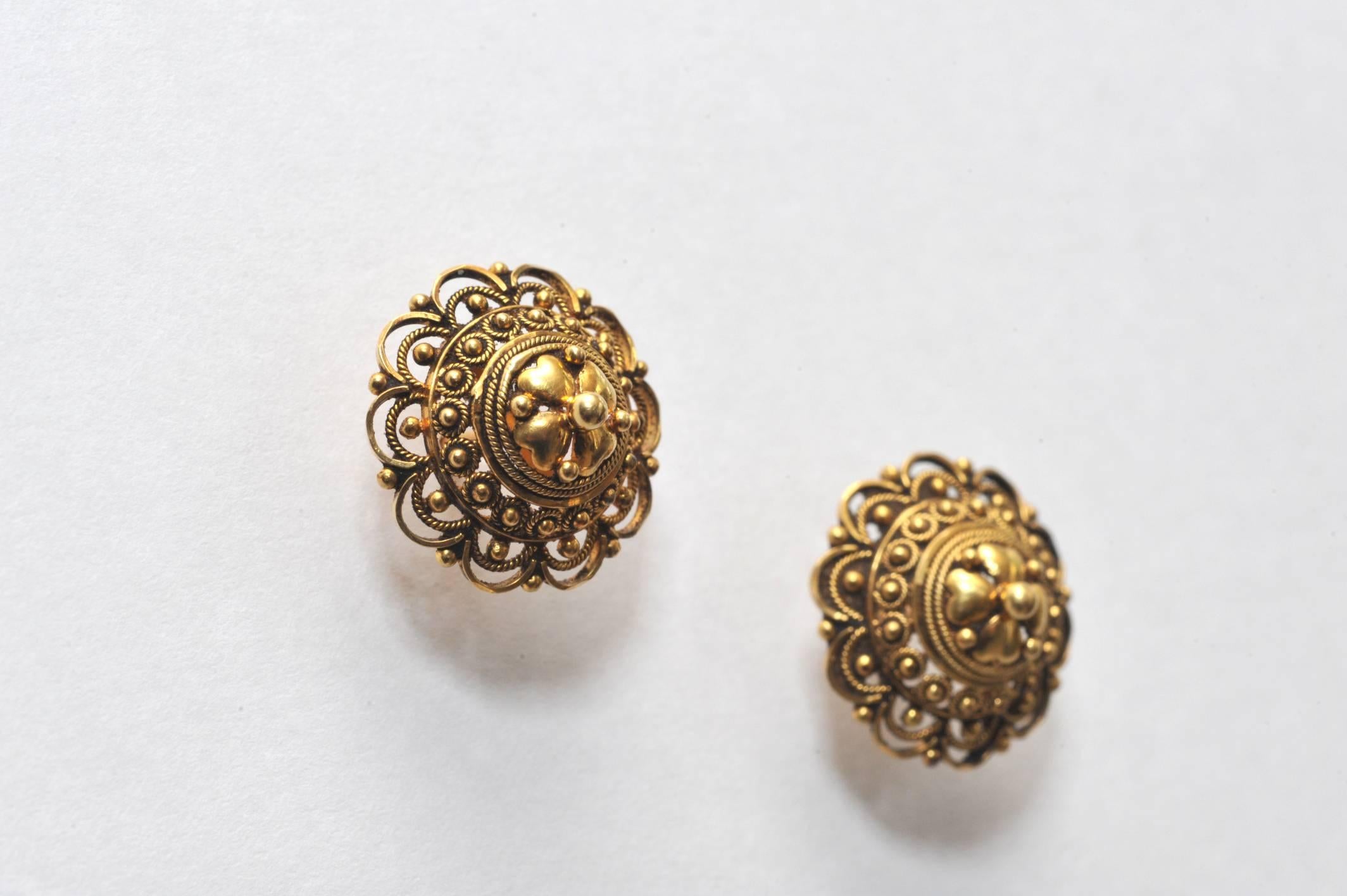 It's all about the details.  Lovely, intricately hand-tooled, 18K gold stud earrings with fine granulation work.  Slightly domed creating depth and dimension.  C. 1940.  India