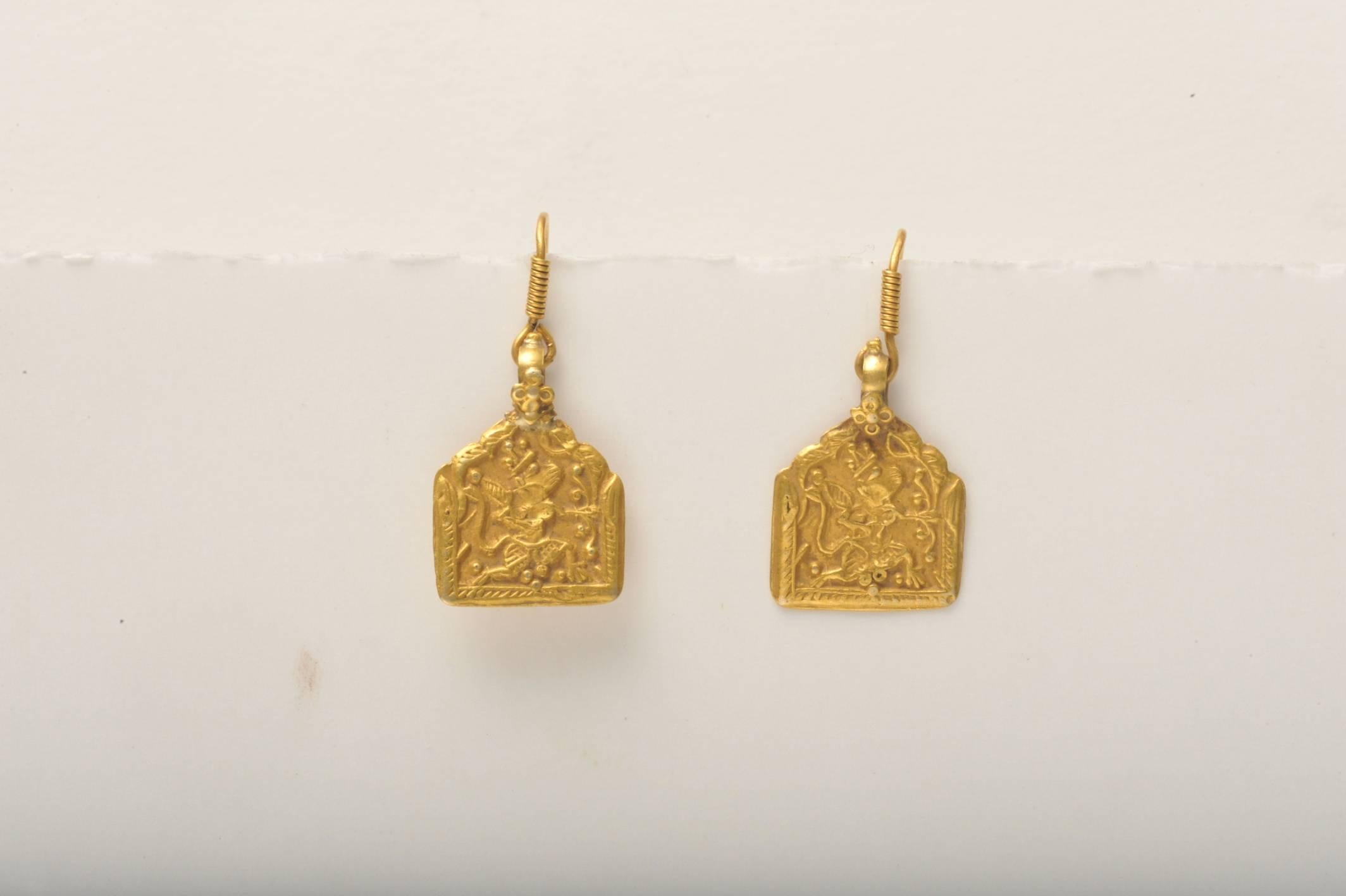 Pair of antique 22K gold Indian jewelry earring pendants depicting Lord Hunuman of Indian Mythology.  Nicely hand-tooled work and French wires added later, for pierced ears.