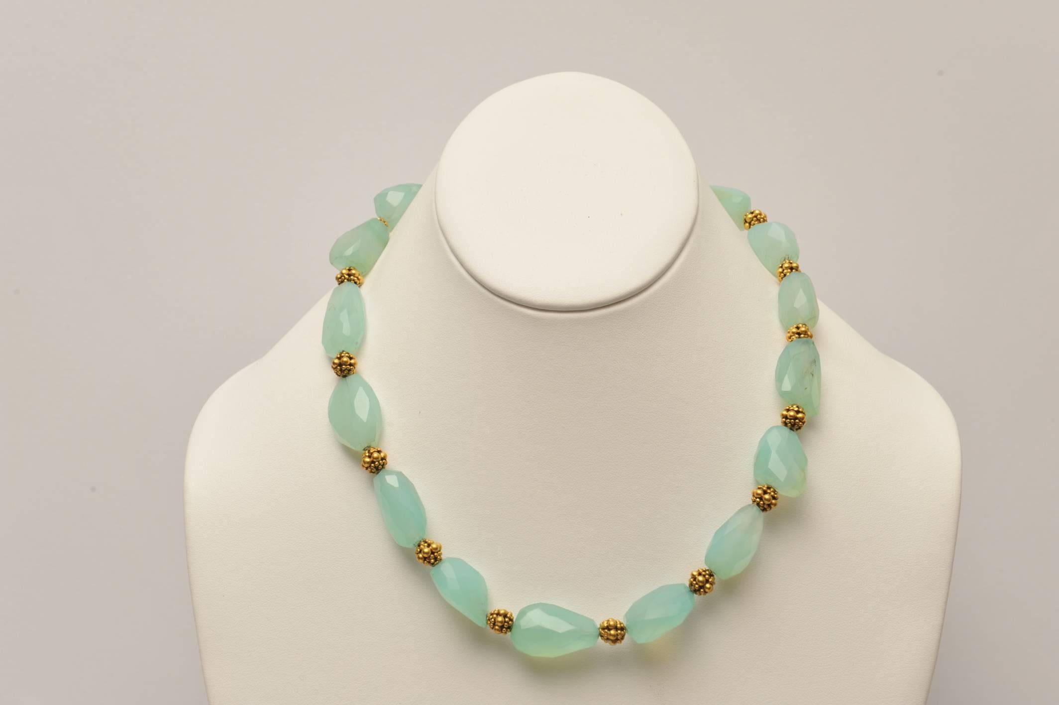 This is actually two separate necklaces, both with tumbled and faceted chalcedony beads (great color), and 22K gold beads with fine granulation work.  One necklace has south sea pearls interspersed and measure 12-13 mm.  They look great together or