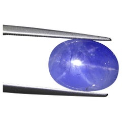Saphir bleu étoilé cabochon ovale 10.83 carats certifié GIA
