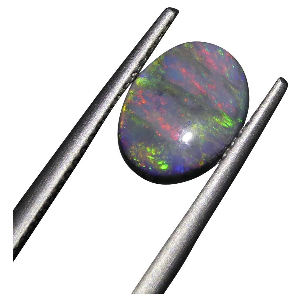 1.42ct Oval Cabochon Black Opal GIA Certified For Sale
