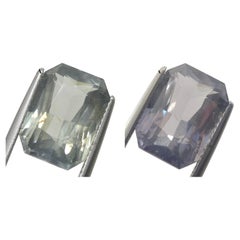 10,03 Karat achteckiger/Emerald-Schliff Traubengrüner, grünlich-blauer bis graugrüner, lila Saphir