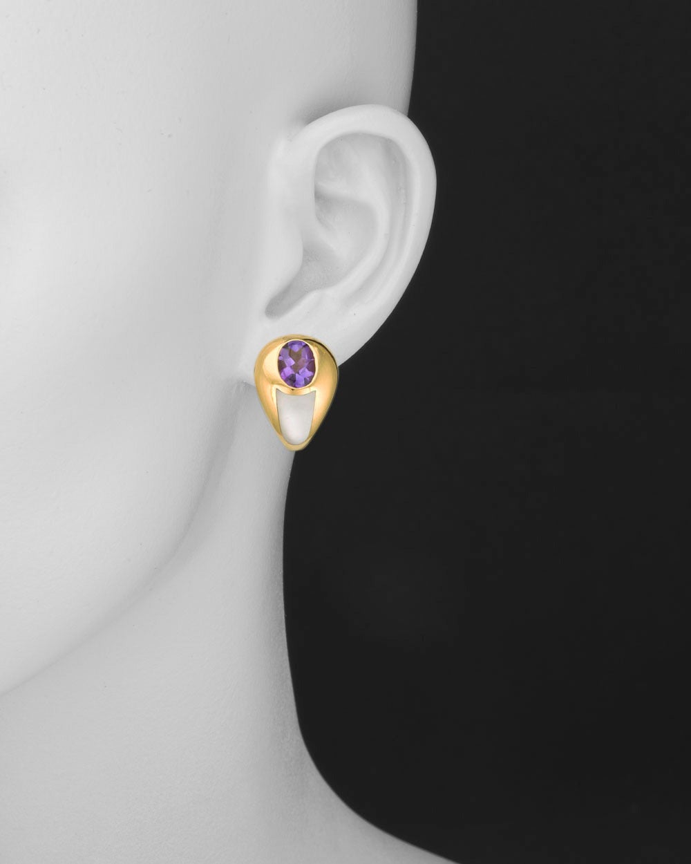 Upside-down pear-shaped half-hoop earclips, the top with oval-shaped buff-top amethyst and bottom with inlaid mother-of-pearl panel set in 18k yellow gold, circa 1990's, numbered 51282, signed Mauboussin Paris.