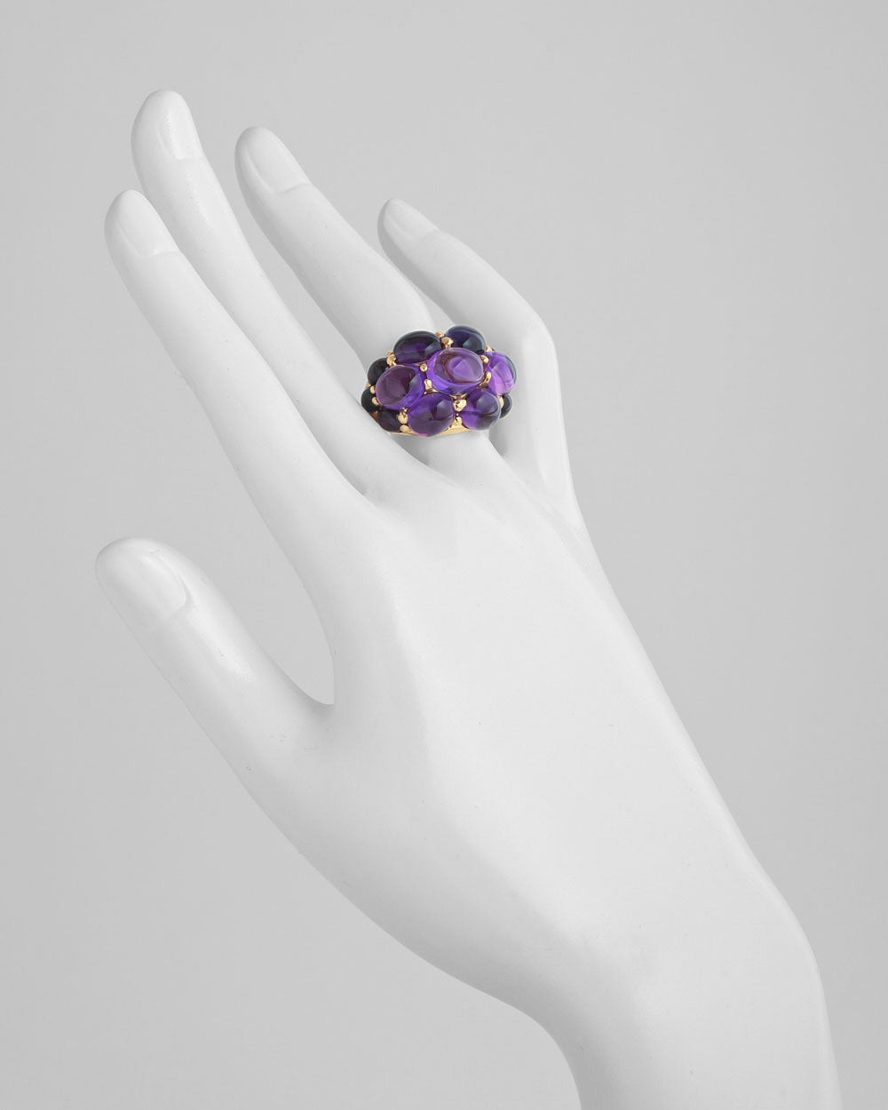 'Elbow' cabochon amethyst ring, mounted in 18k yellow gold, numbered 240253, signed Seaman Schepps. Size 6.75.