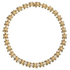 Tiffany 
Co. Diamond Gold "X" Necklace