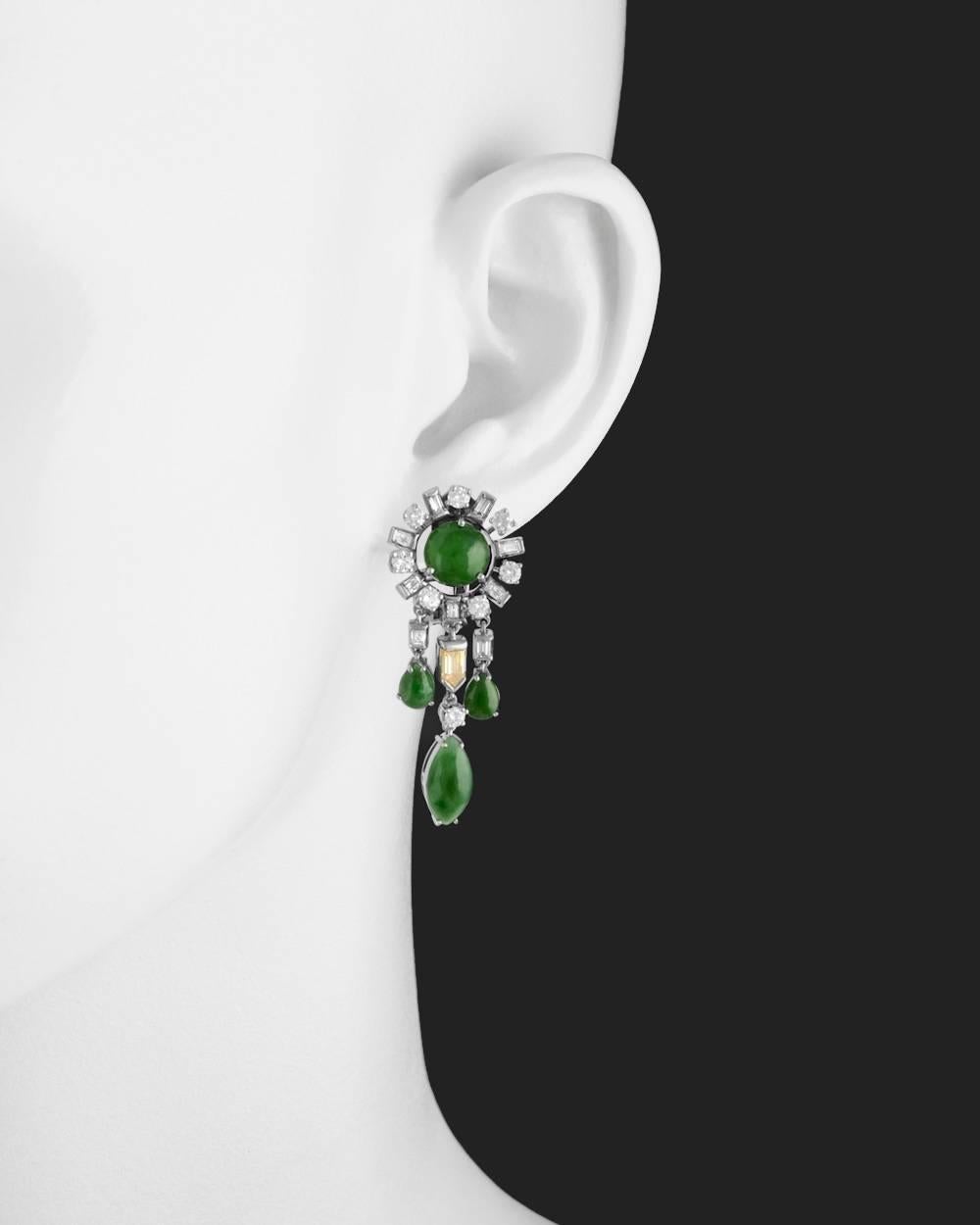 Chandelier-style earrings, designed with a cabochon-cut round jade surrounded by alternating baguette-cut and round-cut white diamonds at top suspending three multicolored diamond and cabochon-cut jade drops, the middle drop with a bullet-cut fancy