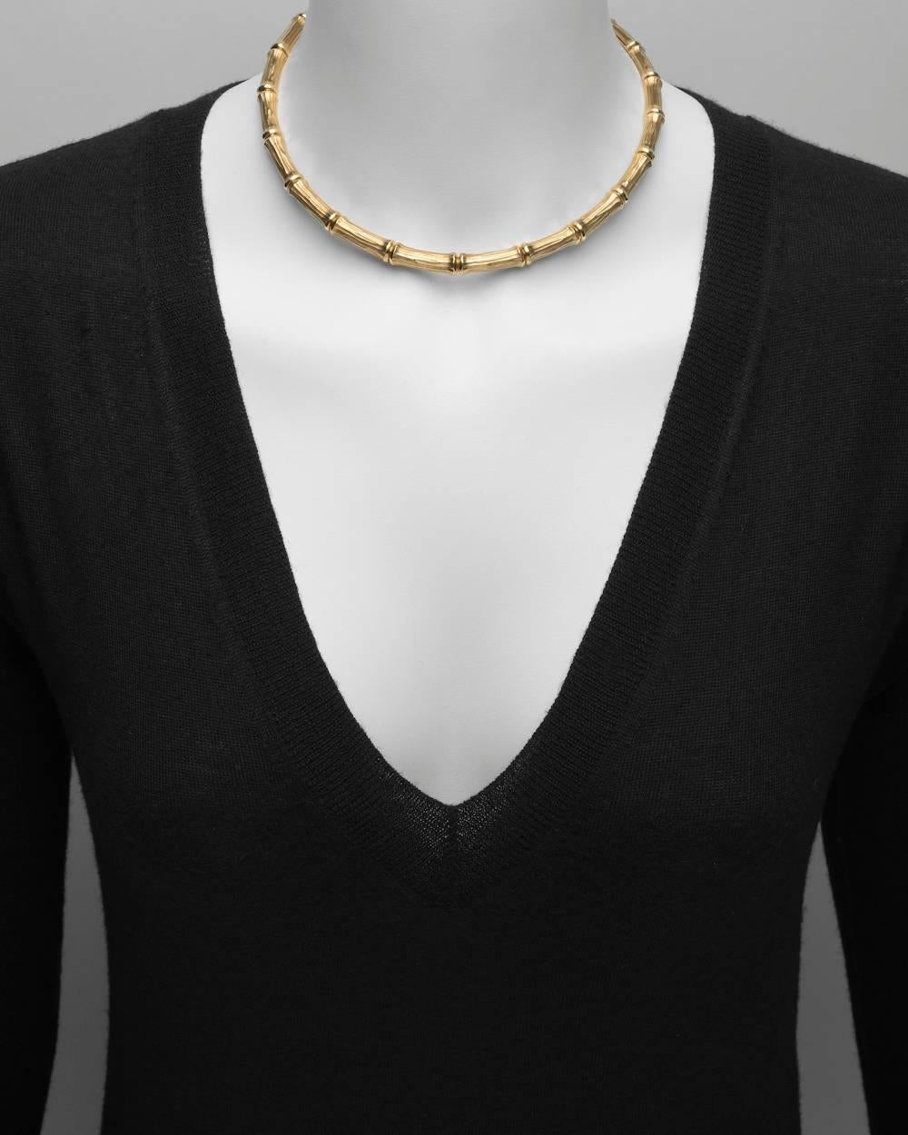 "Bamboo" motif link collar necklace in 18k yellow gold, numbered 709078, signed Cartier. 15.5" approximate length.
