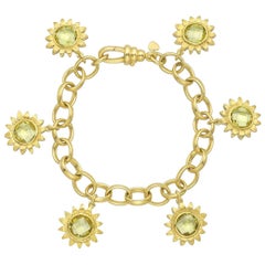 Bielka Yellow Gold and Peridot Sunflower Charm Bracelet