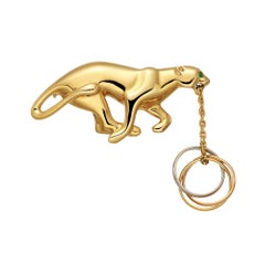 Cartier Gold Panthère Brooch with Trinity Rings