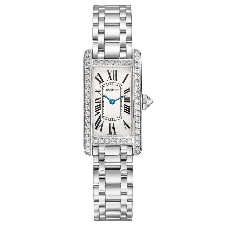 Cartier 18k white gold and diamond Tank Americaine wristwatch, featuring a quartz movement, silvered dial with blued steel sword hands and black Roman numerals, octagonal crown set with a diamond, 34.8 x 19.0mm (small model), 18k white gold case